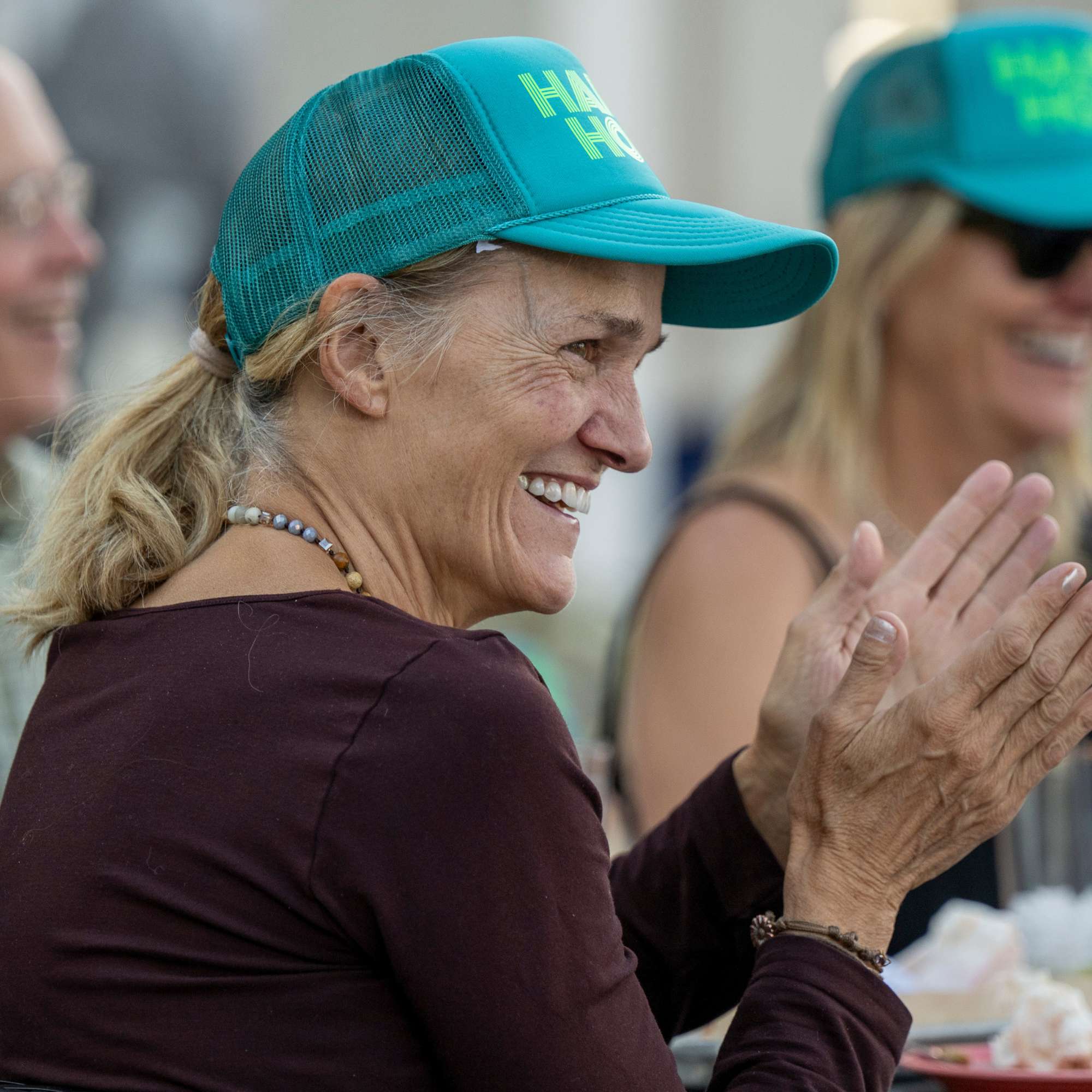 Audience member laughing and clapping at Snowmass Live Comedy WKND!, The Collective Snowmass