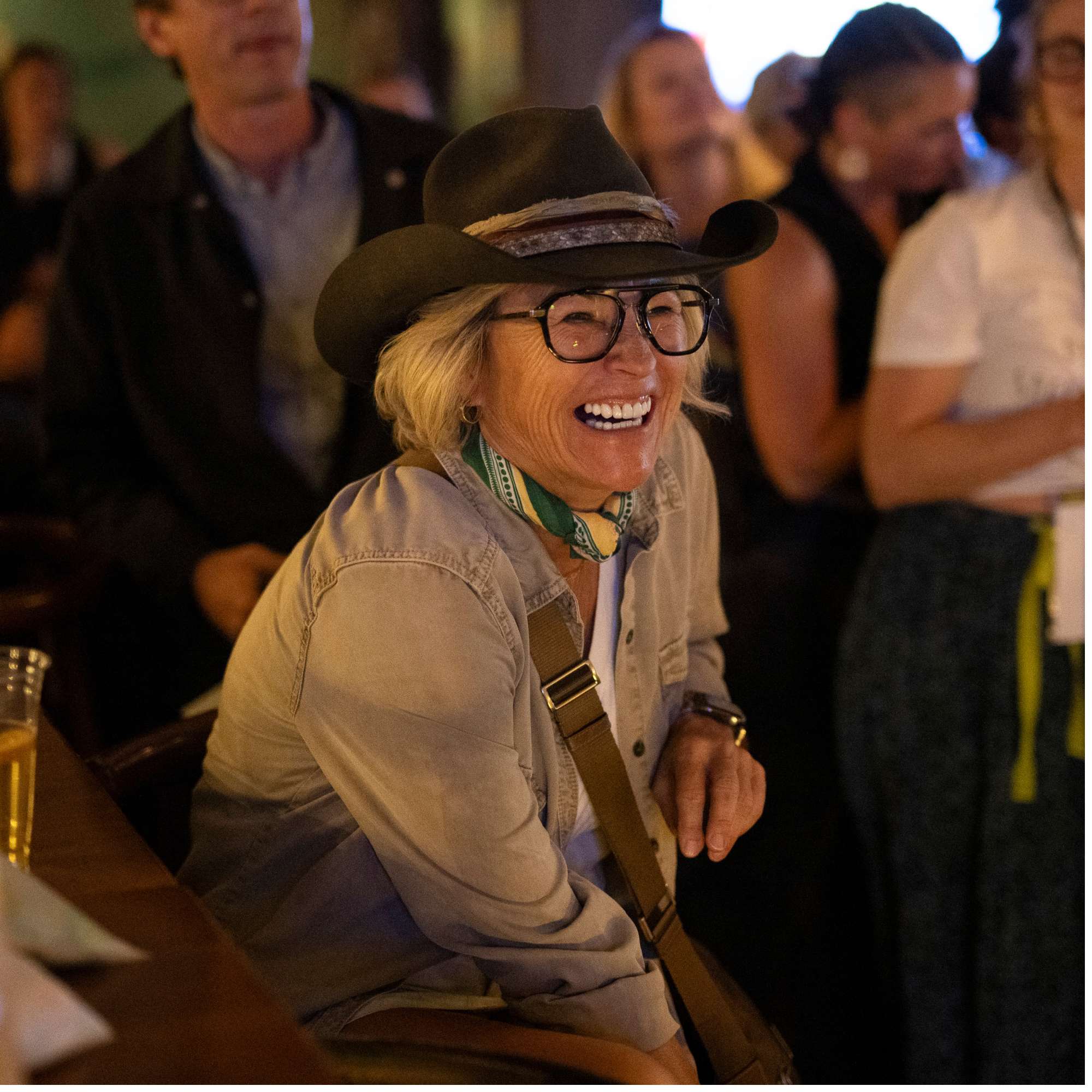 Audience member in a cowboy hat laughing in the crowd at Snowmass Live Comedy WKND!, The Collective Snowmass