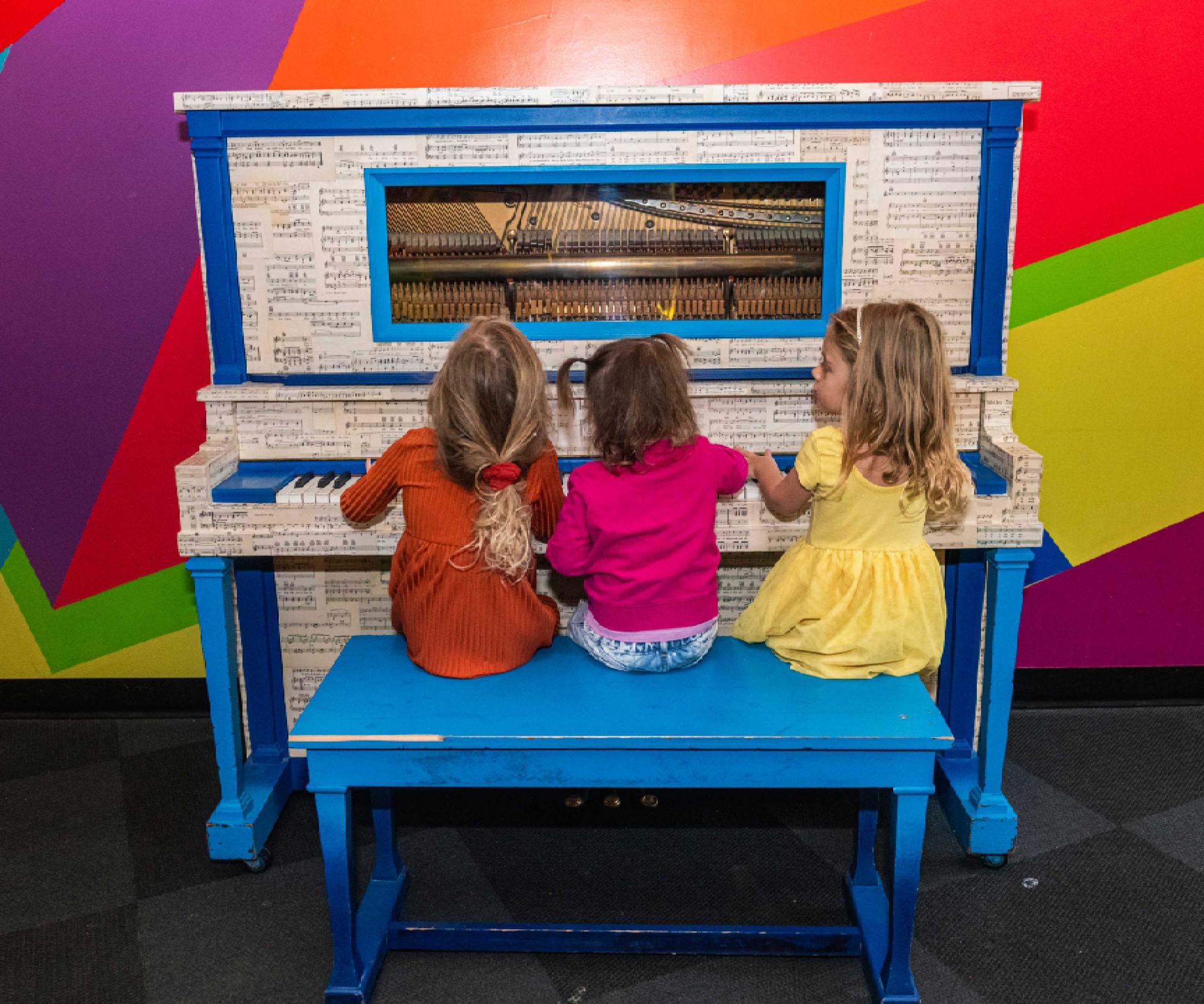 Three kids playing the painted piano, The Collective Snowmass